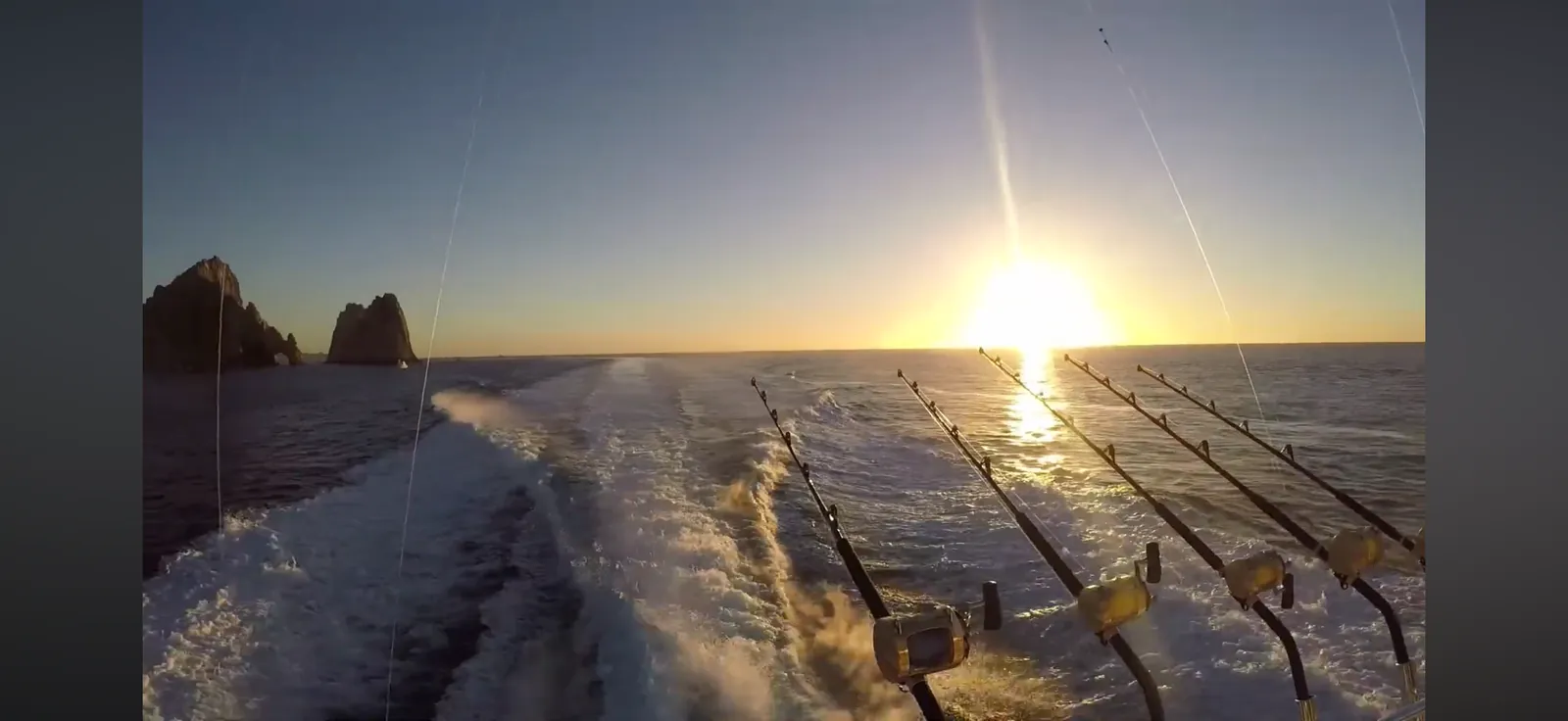 Trolling spread set at sunrise with the arch of Cabo San Lucas on the horizon